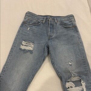 Distressed Blue Denim Jeans